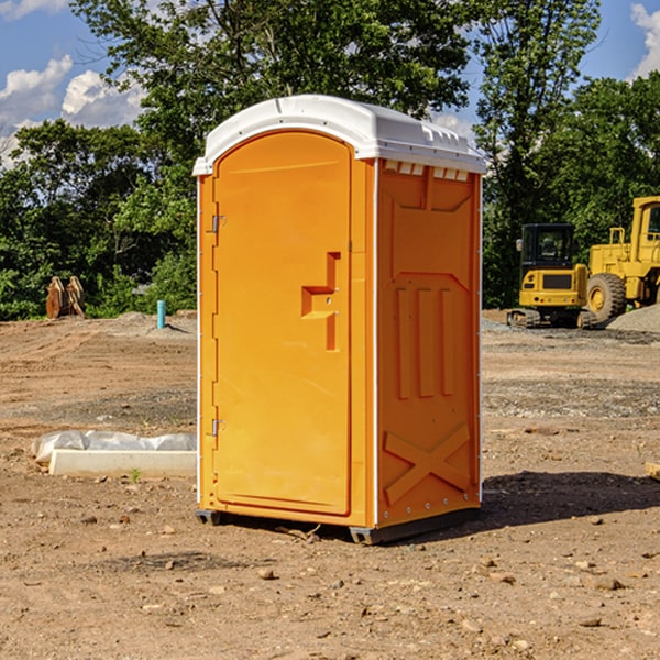 how often are the porta potties cleaned and serviced during a rental period in Scammon